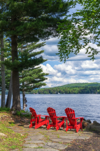 Relaxing by 4th Lake by Marie Costanza